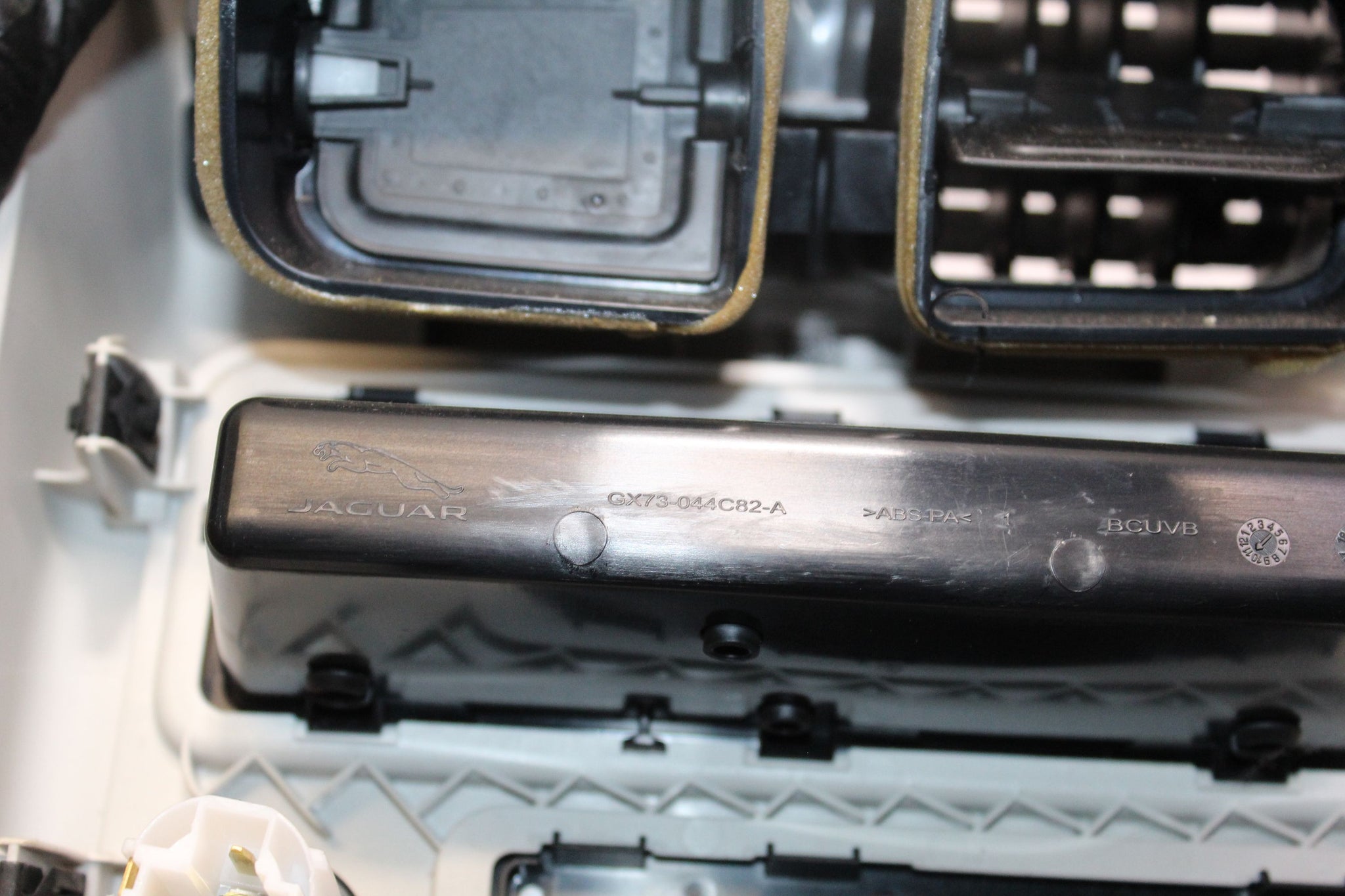 2015 JAGUAR XE Rear Centre Console 12V Socket Air Vent Storage Tray Trim